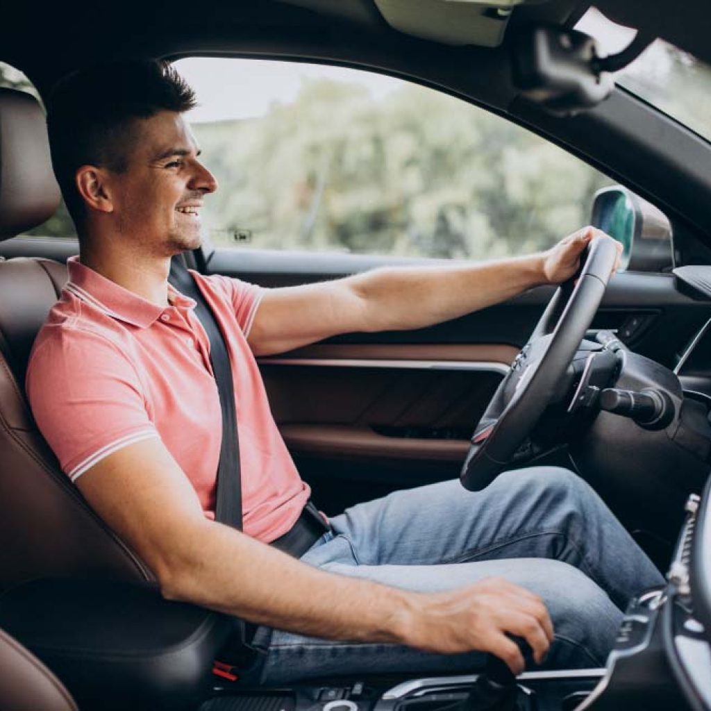 a man taking his practice driving test in our driving school