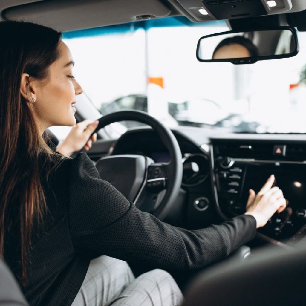 A lady eagerly anticipates commencing her driver’s ed in Arlington at AA Right Track Driving School , where the emphasis is on safety and tailored instruction