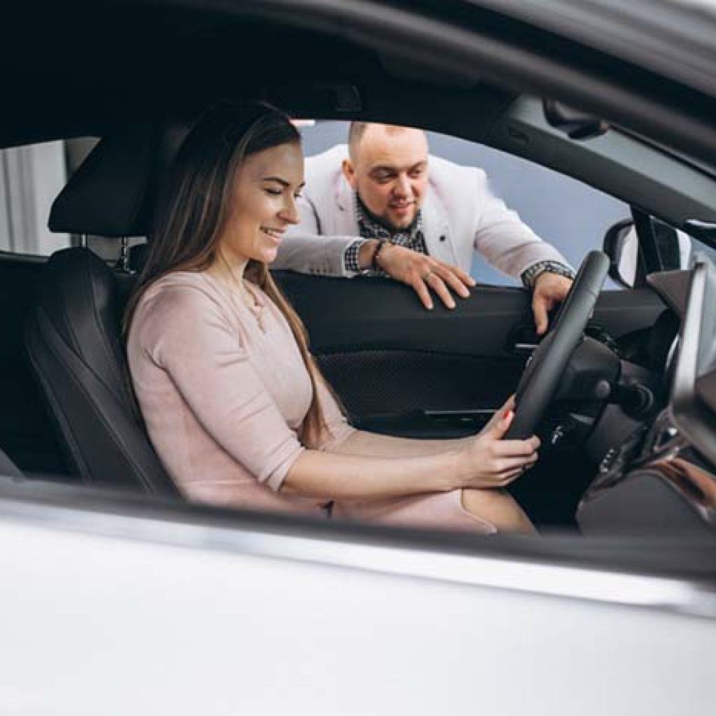 A lady is taking behind the wheel lessons at AA Right Track Driving School with the most affordable driving classes in Richardson.